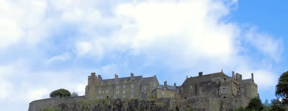 Stirling Castle on its crag above the trees